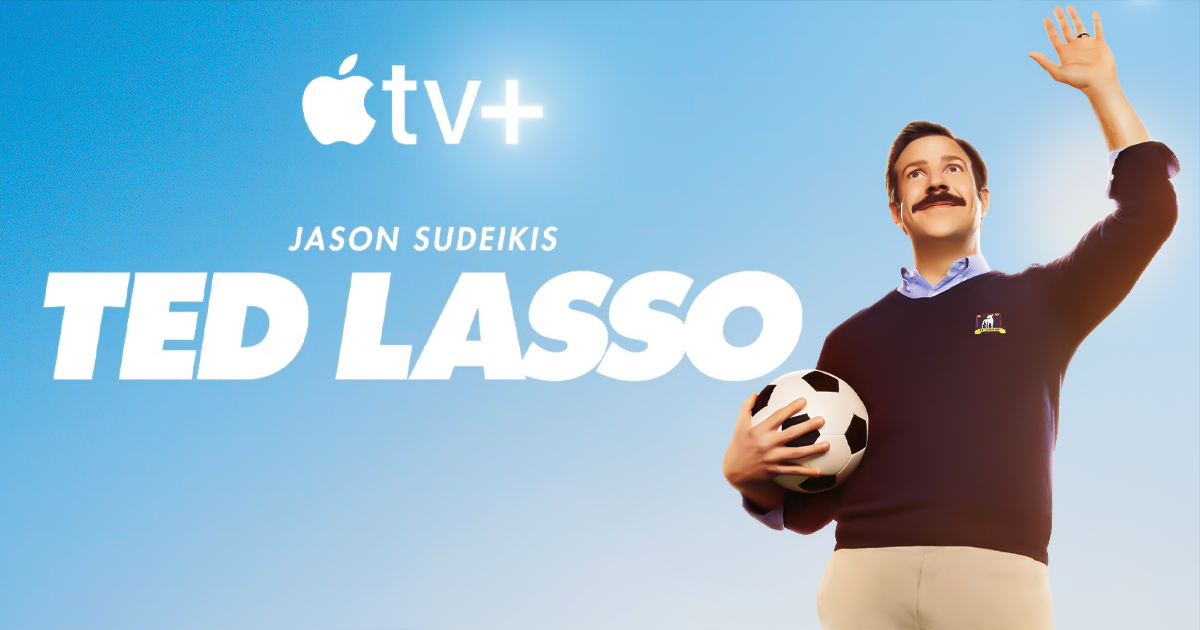 Apple TV Plus promotional image for Ted Lasso featuring Jason Sudeikis holding a soccer ball with Ted Lasso title text.