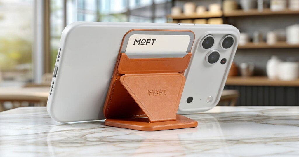 MOFT MagSafe wallet with built in stand attached to iPhone Pro featuring Find My integration