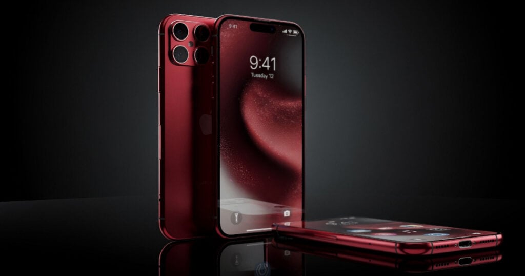 Three iPhone 18 Pro concept devices in a deep red finish, showing the front display, quad-camera back panel, and bottom edge on a reflective black surface.