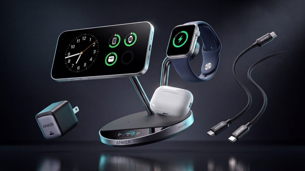 Anker Prime 3-in-1 magnetic charging station floating on a dark background with an iPhone in landscape StandBy mode, an Apple Watch on the arm, AirPods on the base, plus an Anker USB-C wall charger and a braided USB-C cable.