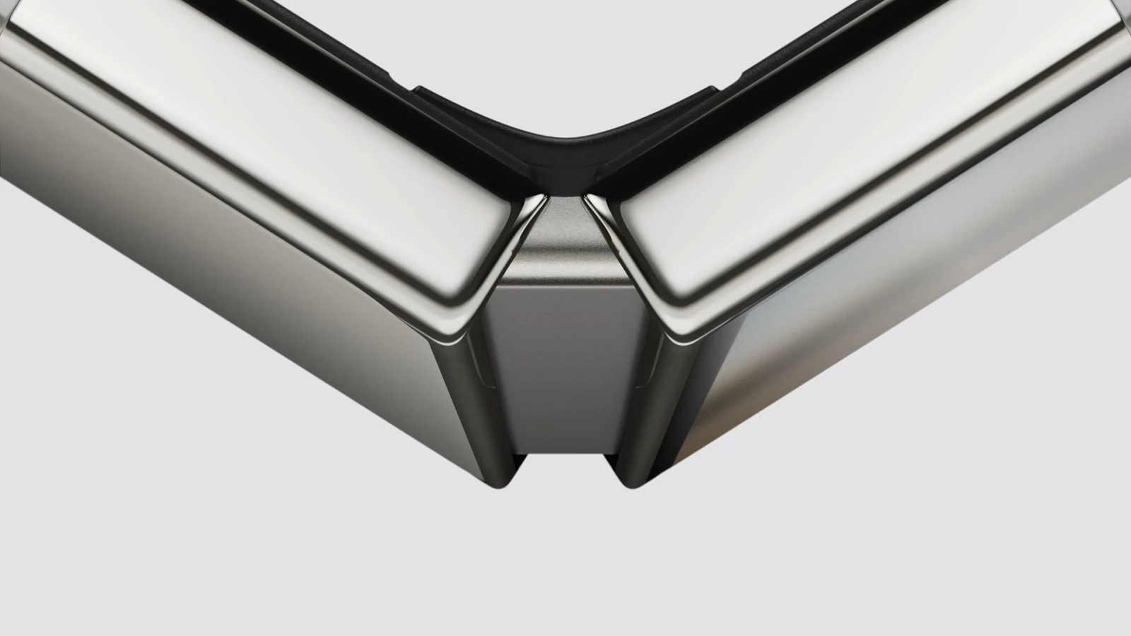Close-up of the iPhone Duo titanium hinge and enclosure edge