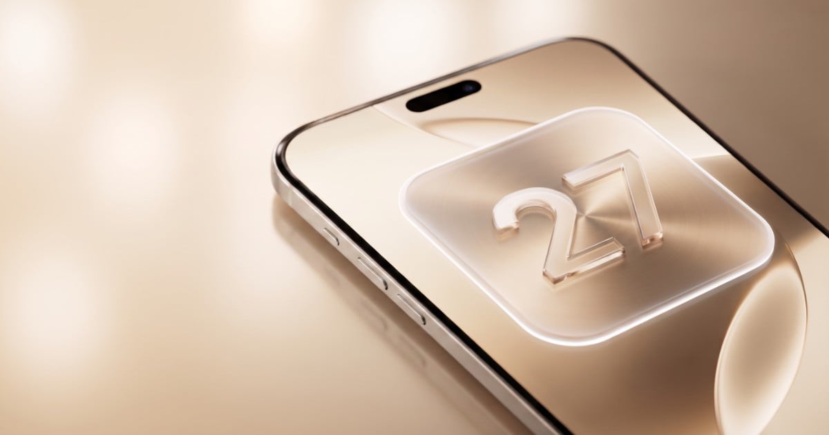 An iPhone 17 Pro at a three-quarter angle on a warm cream surface, its screen showing a single frosted-glass widget tile containing the numerals 27 in bevelled bronze.